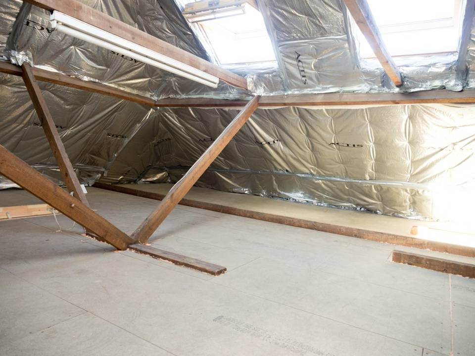Foil faced insulation under attic rafters